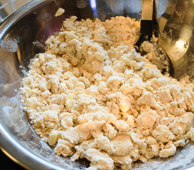 Stir in buttermilk, then smoosh with your hands until it forms one unit.